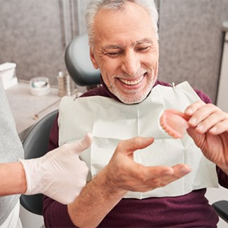 Dentures patient in Dallas smiling 