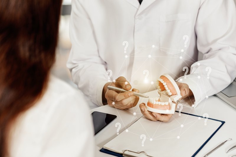 A dental patient consulting their dentist